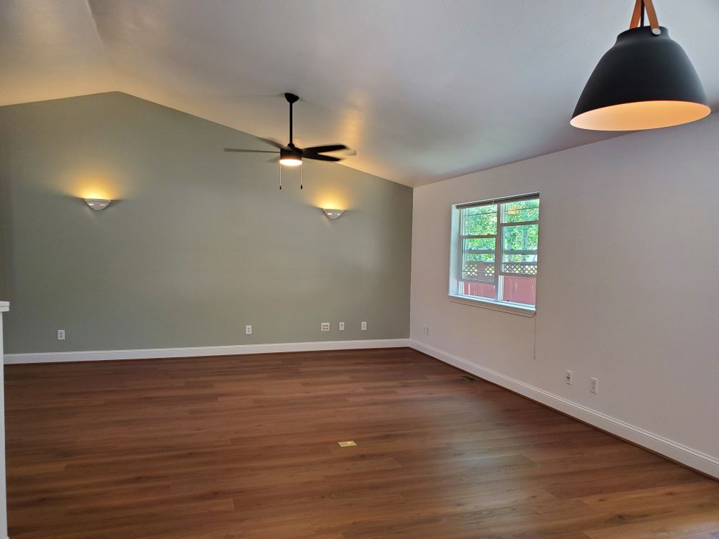 20 New Living & Dining Room with Sage Feature Wall